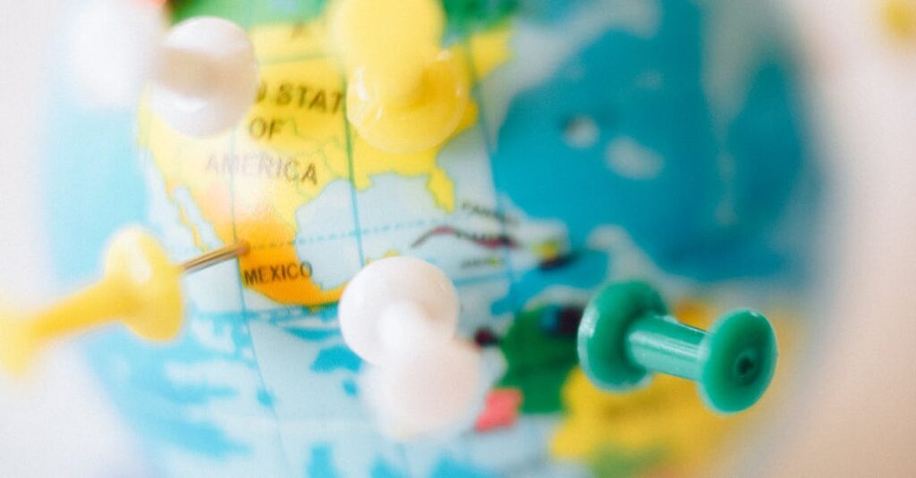 A vibrant globe with colorful pins marking destinations, symbolizing travel plans.